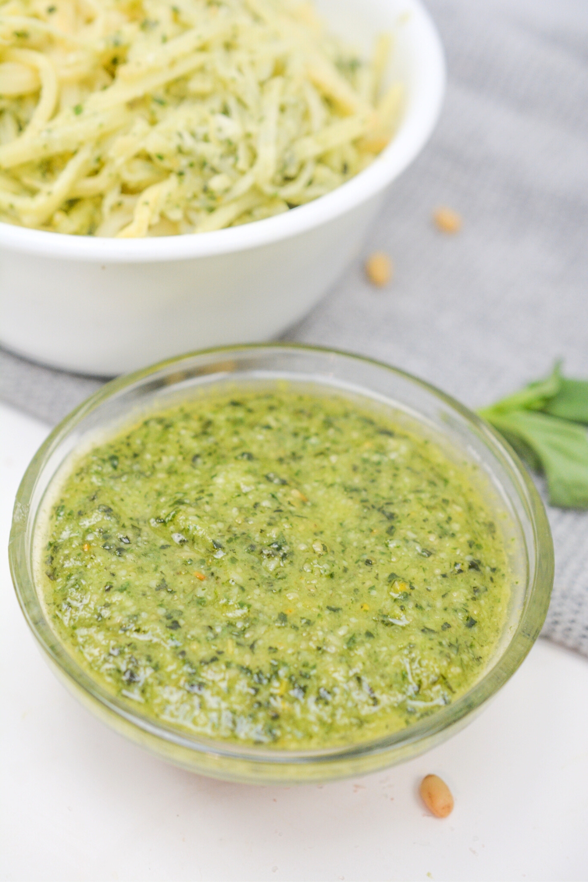 homemade pesto with pine nuts and basil leaves