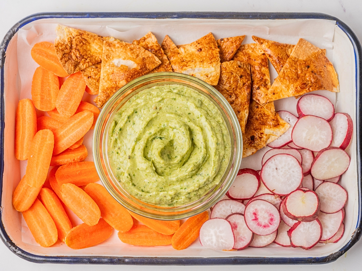 herby avocado dip with radishes