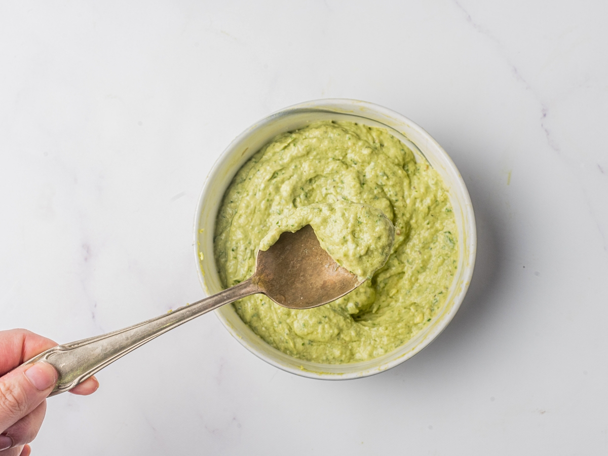 creamy avocado sauce on a bowl