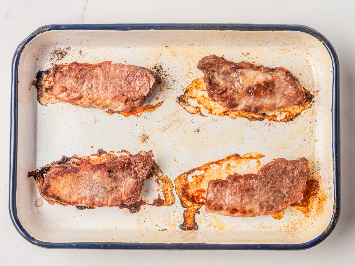 cooked pork ribs on baking pan