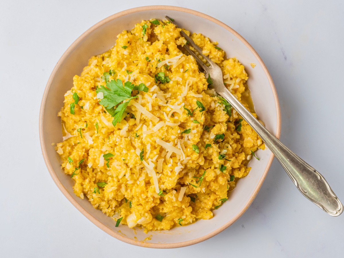 a bowl of pumpkin risotto with cauliflower rice
