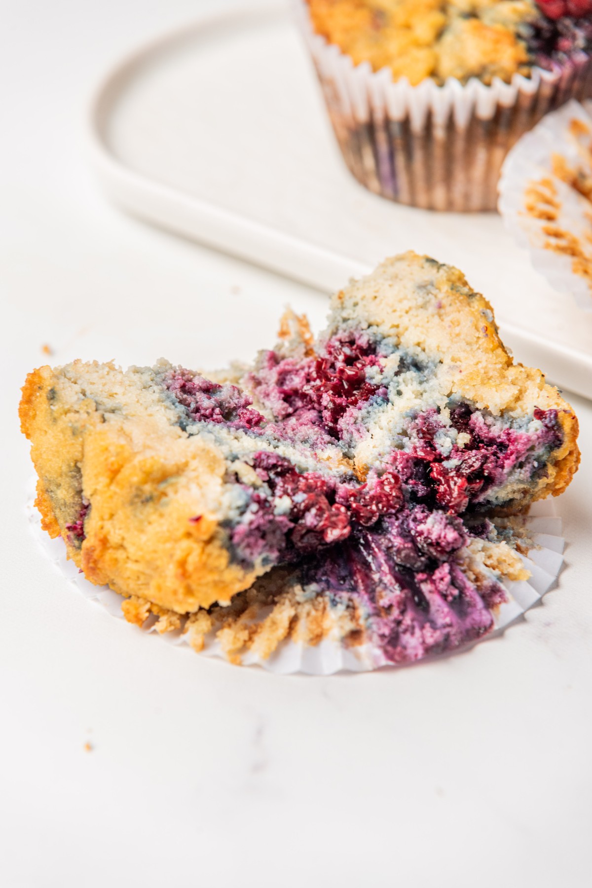 bursted blackberries in keto muffin