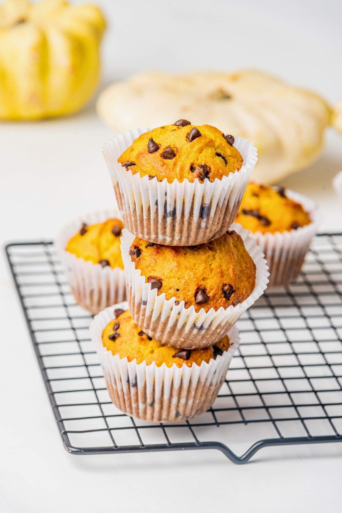 pumpkin chocolate chip muffins stacked