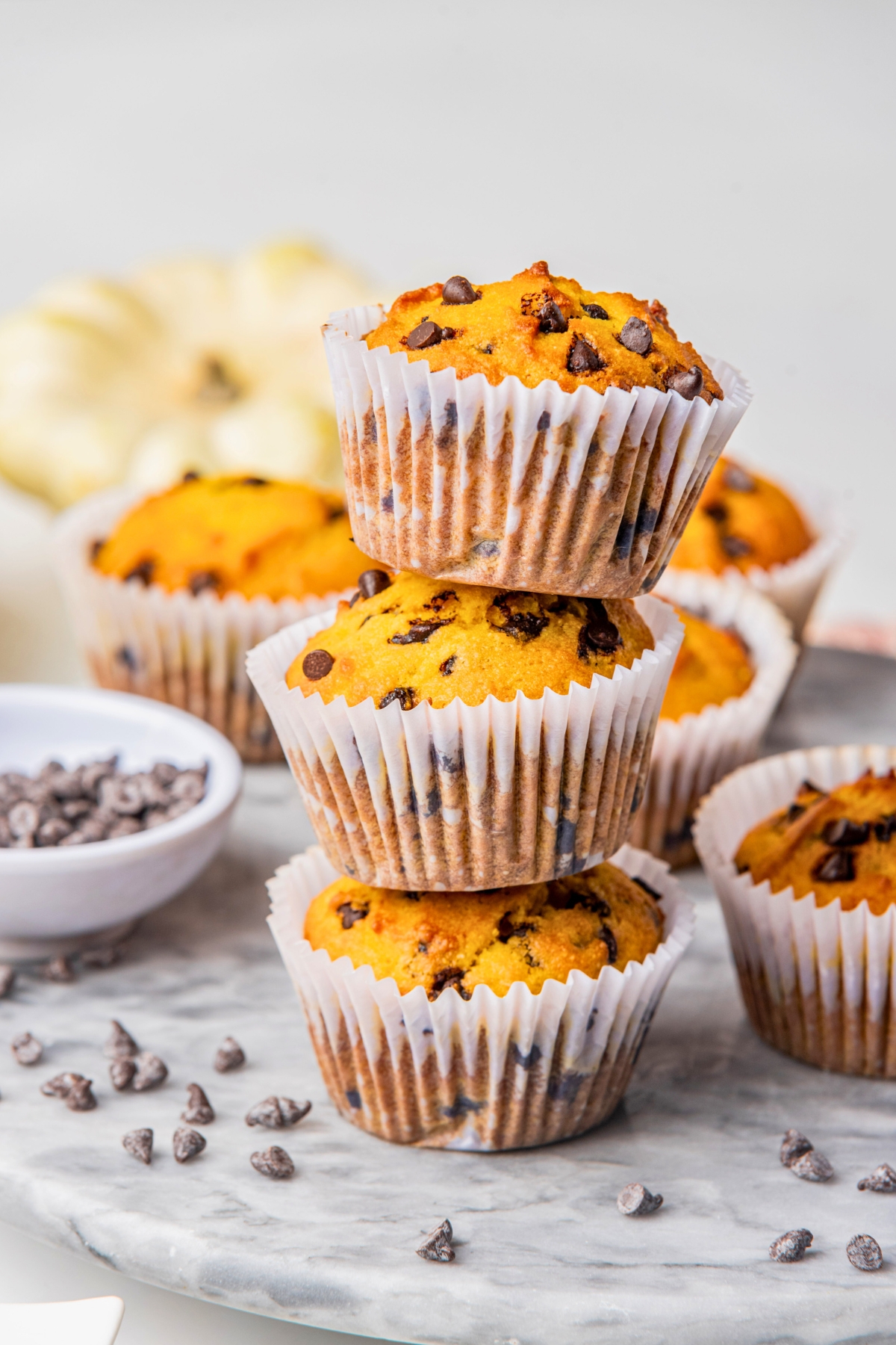 gluten free pumpkin muffins stacked chocolate chips