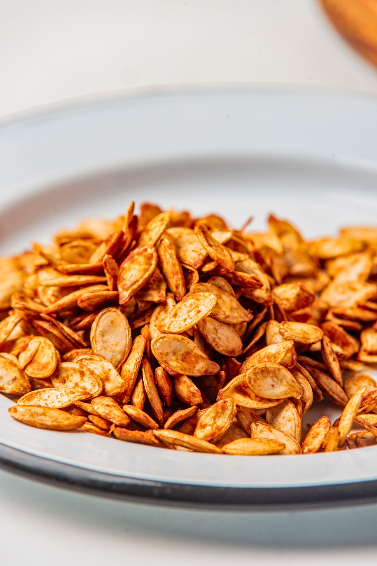 close up of how to cook pumpkin seeds in air fryer. 