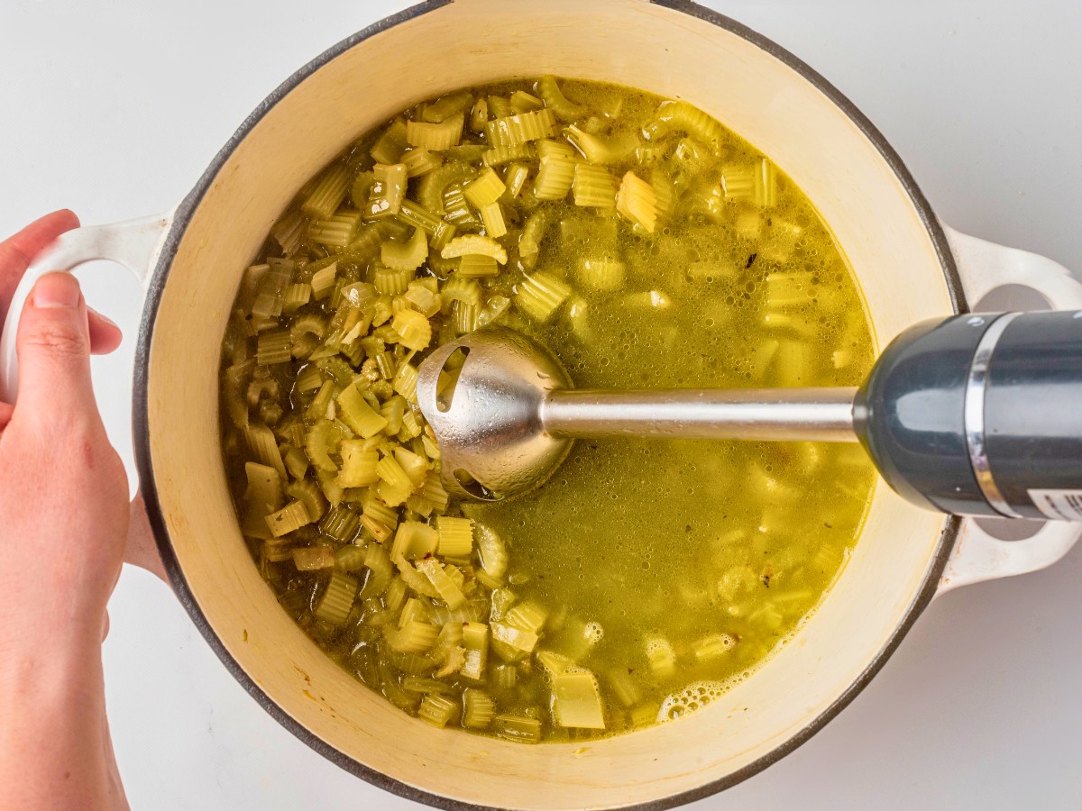 pureeing veggies in a pot