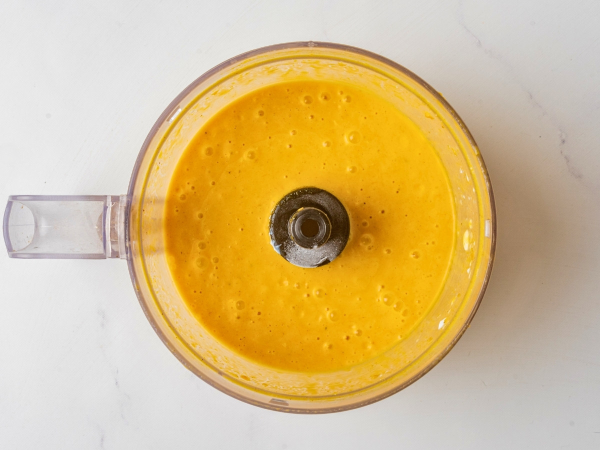 blended pumpkin smoothie in a blender.