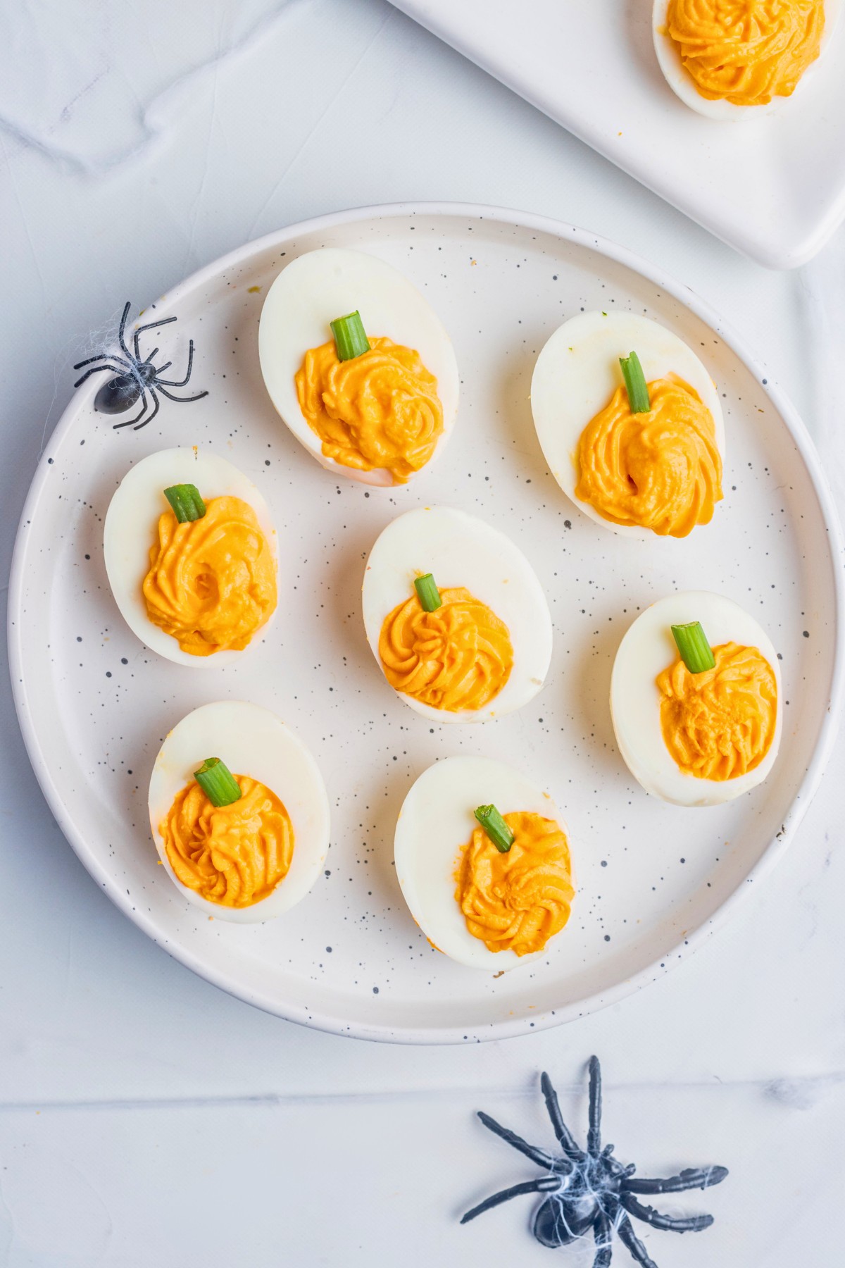 overhead shot of pumpkin deviled eggs. 