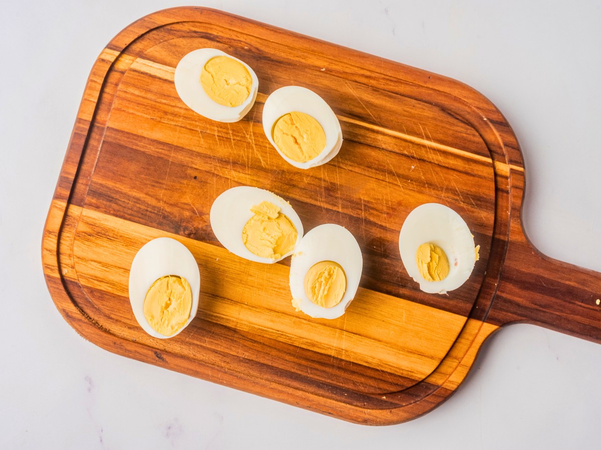 cutting boiled eggs in half. 