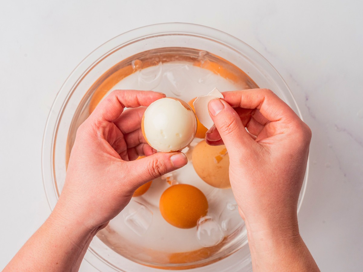 peeling cooled eggs. 