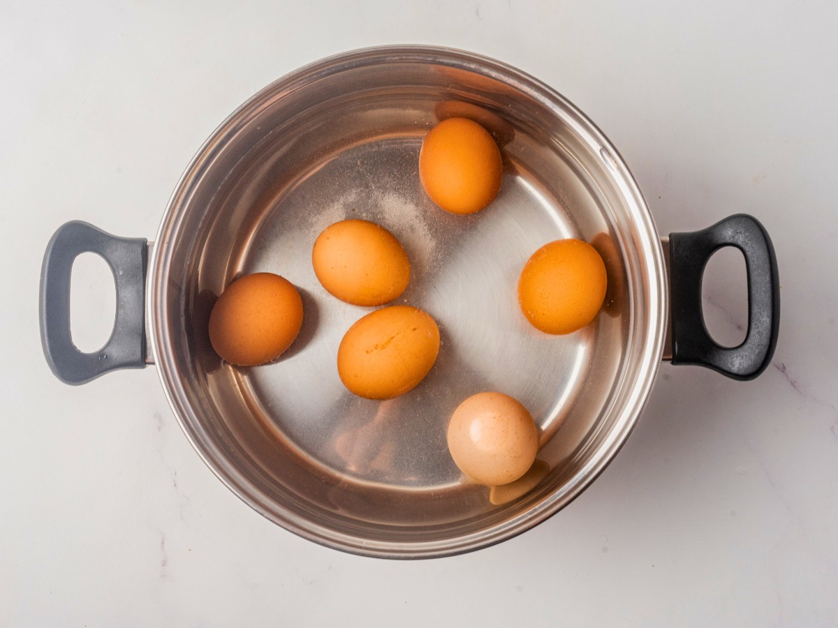 boiling eggs in a pot. 