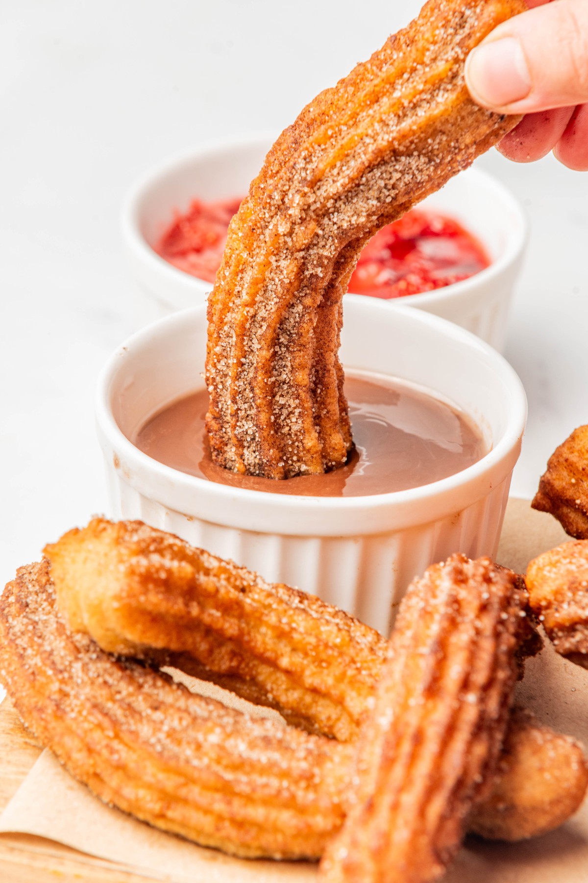churros dipped in sauce