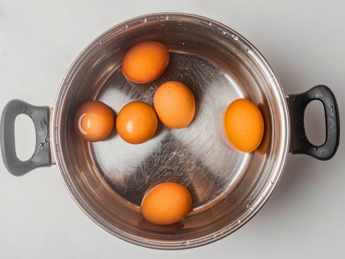 boiling eggs in a hot water pot