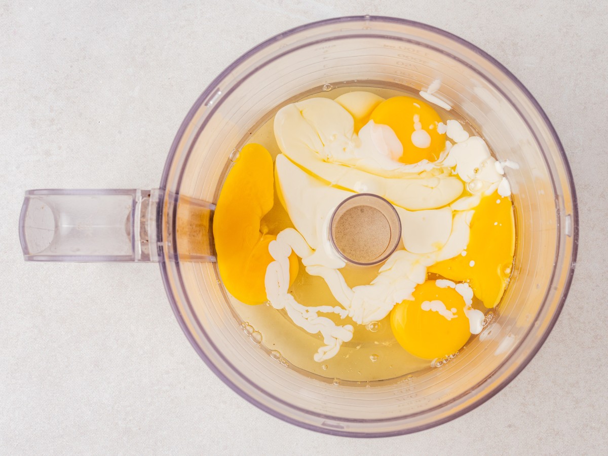 Eggs and butter in food processor