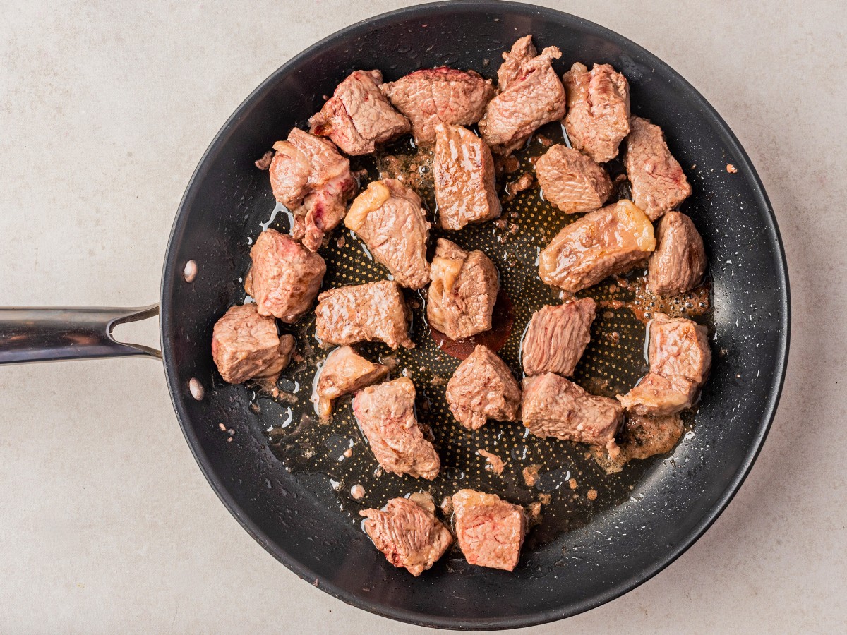 browned meat in pan