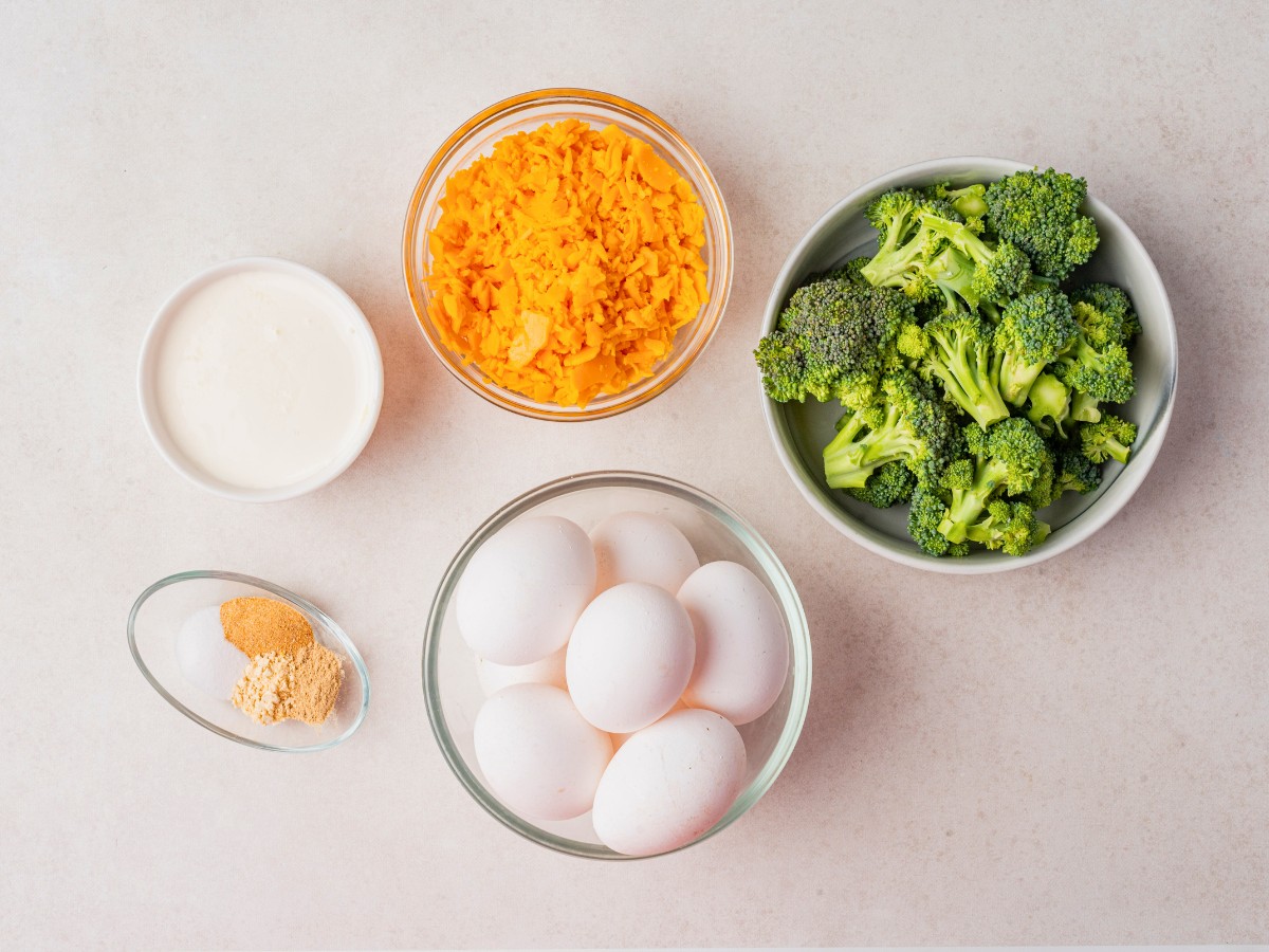 overhead shot of ingredients for crustless broccoli cheddar quiche.