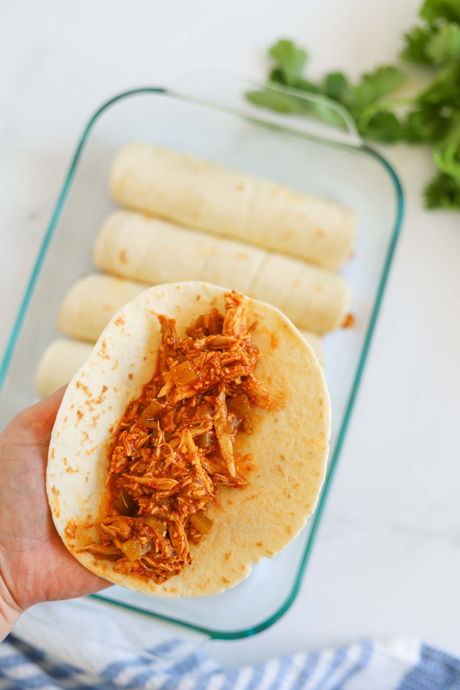 filling low carb tortillas with enchilada chicken filling 