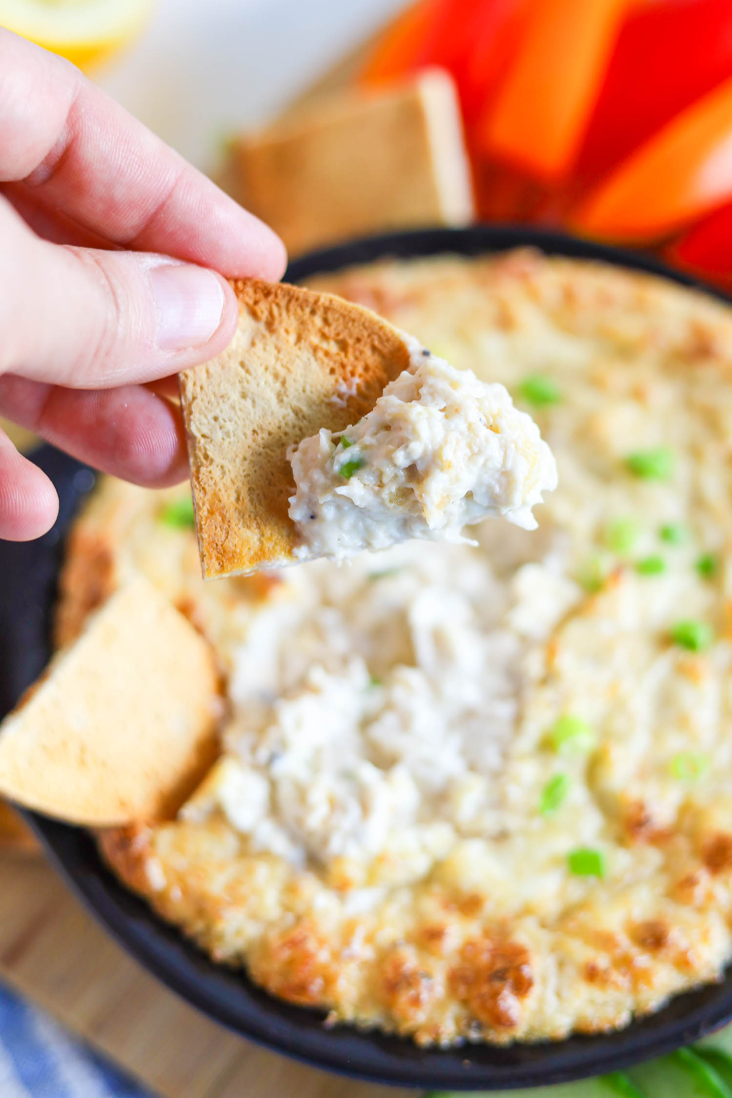 a scoop of homemade crab dip with bread