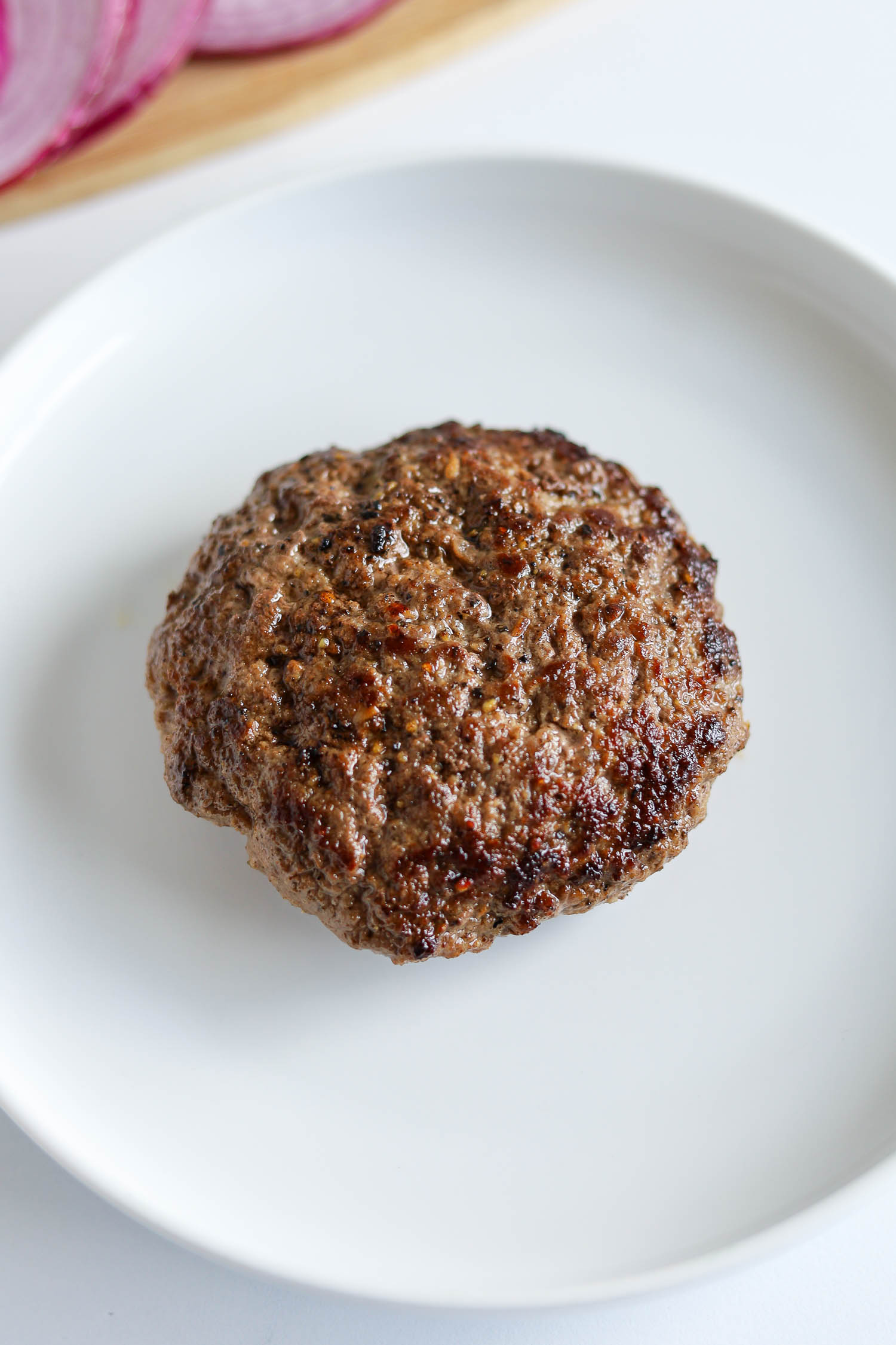 grilled juicy lucy burger on a plate 