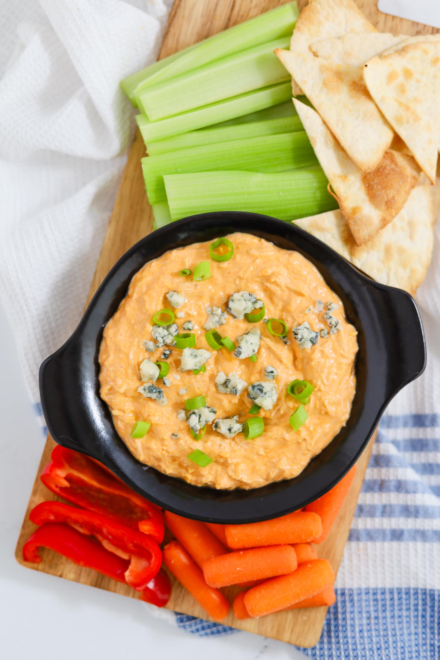 buffalo chicken dip served with blue cheese and veggies 