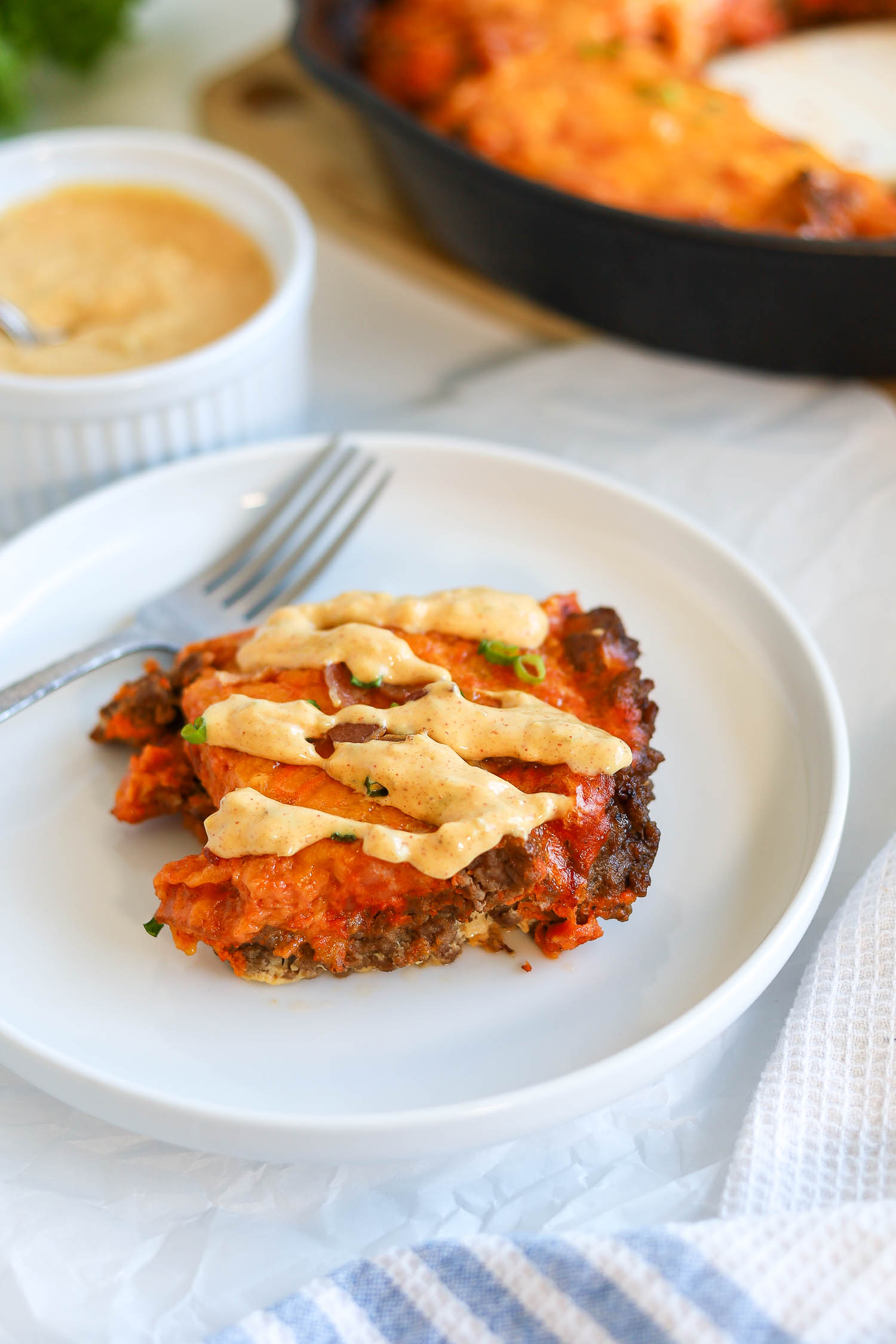 eating bacon cheeseburger casserole with big mac sauce