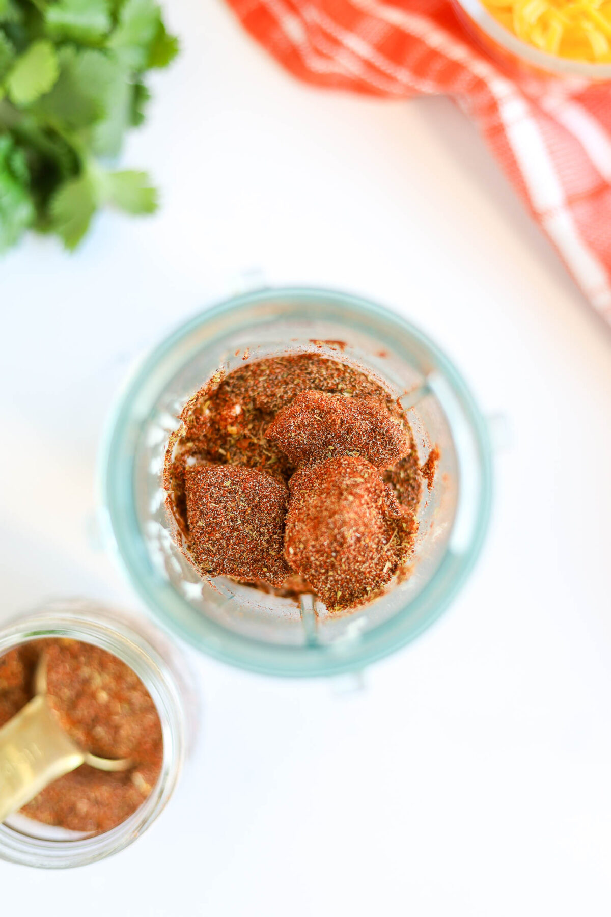 adding cottage cheese and spices to the blender.