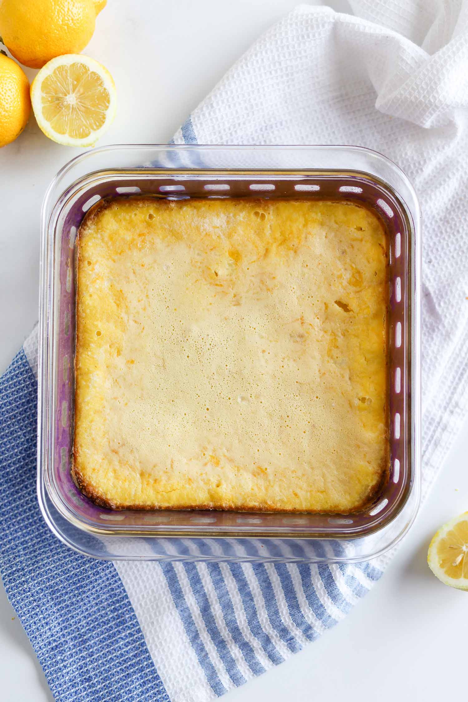 Baked healthy lemon bars in a glass dish